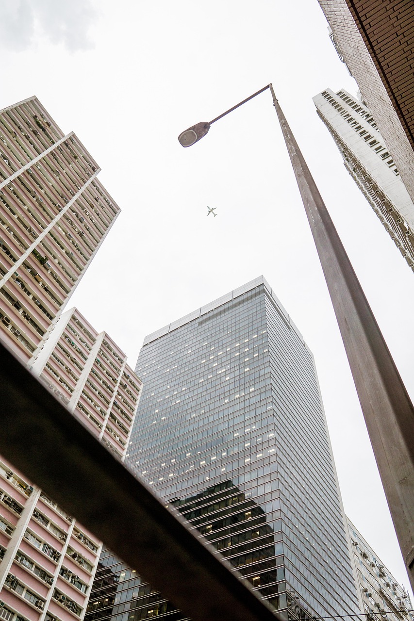 building, tower, urban, airplane, modern, city, architecture, sky, journey, nature, travel